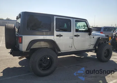 2011 Jeep Wrangler Unlimited Sahara из США, поврежденный, VIN 1J4BA5H16BL521963